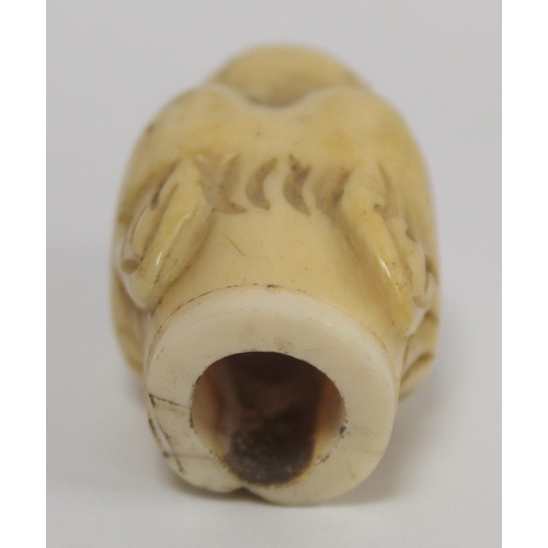 341 - 19th century ivory walking stick finial in the form of a leopard's head, 5.5cm long and two other fi... 