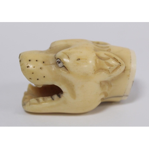 341 - 19th century ivory walking stick finial in the form of a leopard's head, 5.5cm long and two other fi... 