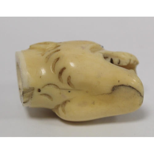 341 - 19th century ivory walking stick finial in the form of a leopard's head, 5.5cm long and two other fi... 