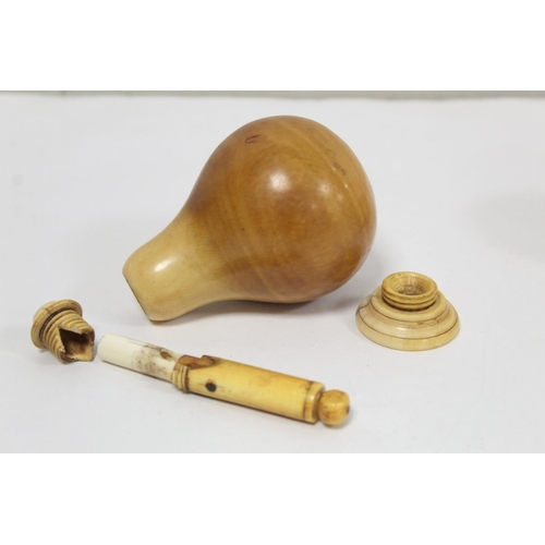 349 - Unusual antique ivory turned vessel of pear form with screw top and base and sprung column, probably... 