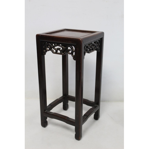 363 - 19th or early 20th century Chinese hardwood stand of square form with fret carved panels and four st... 