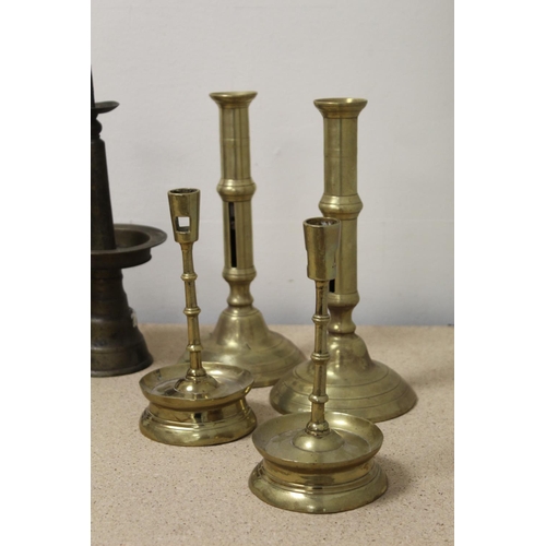 382 - Pair of brass pricket candlesticks and four other pairs of brass candlesticks.  (10).