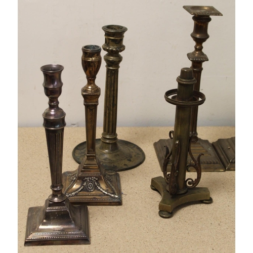 383 - Pair of brass candlesticks with reeded columns and square plinth base; pair of Georgian desk candles... 