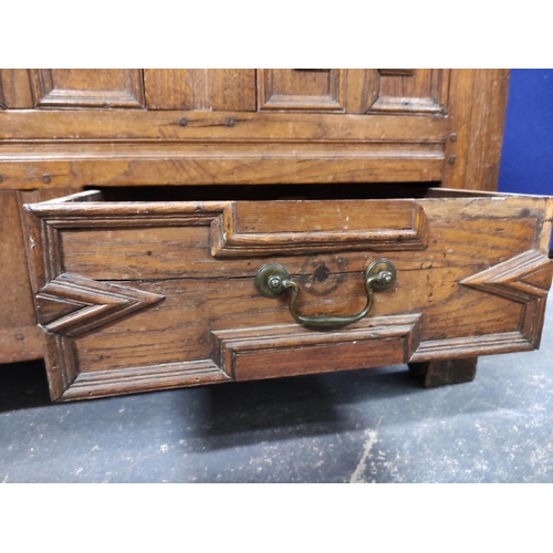 557 - William & Mary oak coffer, with a carved panelled front, bearing inscription ER and dated 1696, ... 