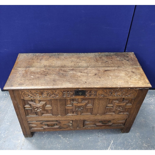 557 - William & Mary oak coffer, with a carved panelled front, bearing inscription ER and dated 1696, ... 