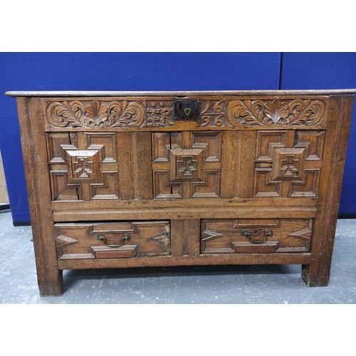 557 - William & Mary oak coffer, with a carved panelled front, bearing inscription ER and dated 1696, ... 