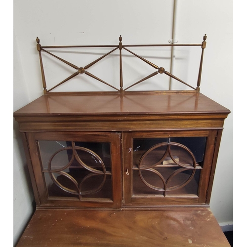 558 - Georgian style mahogany cabinet on chest, with metal rail above two glazed doors, enclosing a shelve... 