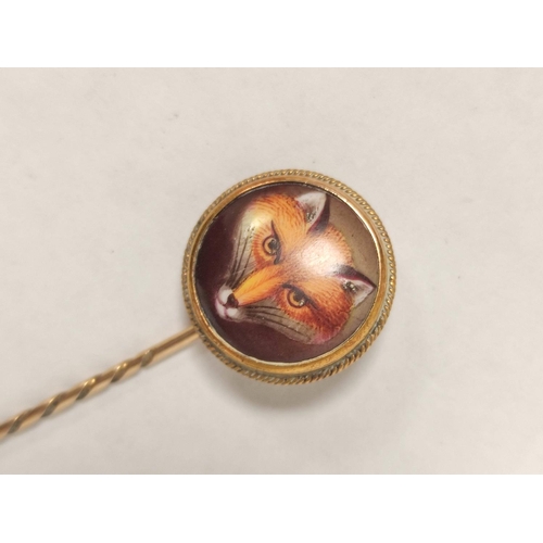 24 - Victorian gold scarf pin with painted fox head, in the manner of W B Ford, probably 15ct.