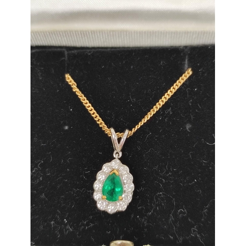 60 - Pendant of pear shape, with an emerald and diamond brilliants in 18ct white gold, on curb necklet '7... 