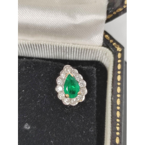 61 - Pair of earrings of pear shape with an emerald and diamond brilliants, matching the preceding, 11mm.