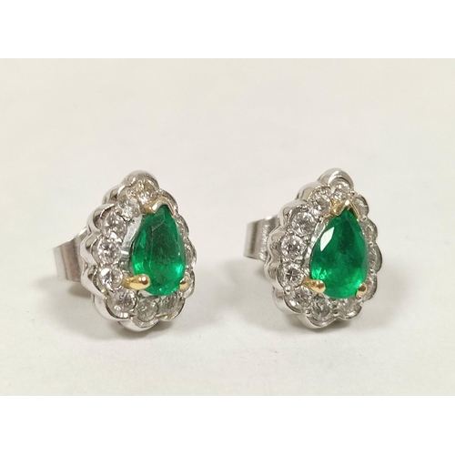 61 - Pair of earrings of pear shape with an emerald and diamond brilliants, matching the preceding, 11mm.