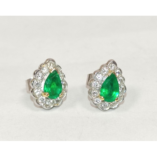 61 - Pair of earrings of pear shape with an emerald and diamond brilliants, matching the preceding, 11mm.