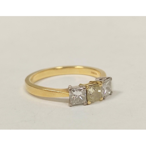 62 - Unusual diamond three stone ring with princess cut brilliants, approx. 4mm square, the centre of cha... 