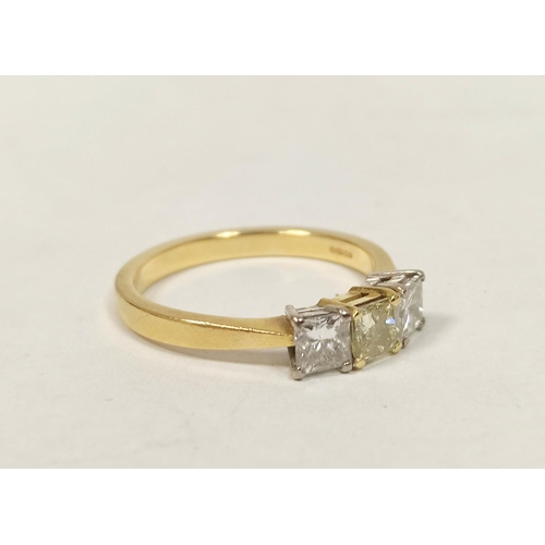 62 - Unusual diamond three stone ring with princess cut brilliants, approx. 4mm square, the centre of cha... 