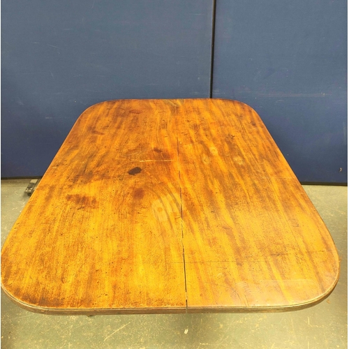 566 - 19th century mahogany tilt top breakfast table raised on a turned column and quadruped feet with bra... 