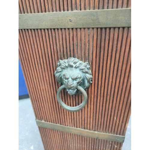 571 - Early 20th century oak stick stand with faux wicker sides bound with brass banding & lions mask ... 