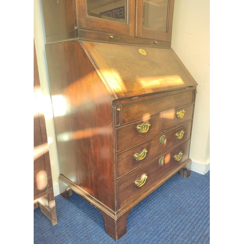 573 - Mid 18th century red walnut bureau bookcase with  glazed doors above a fall-front enclosing fitted i... 