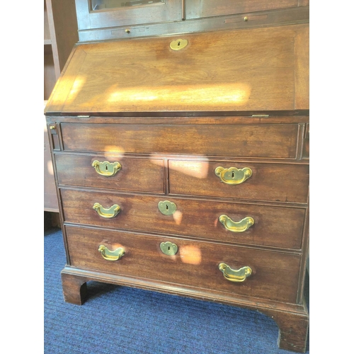 573 - Mid 18th century red walnut bureau bookcase with  glazed doors above a fall-front enclosing fitted i... 