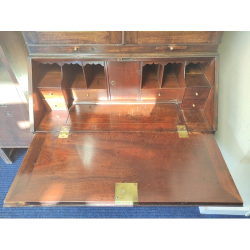 573 - Mid 18th century red walnut bureau bookcase with  glazed doors above a fall-front enclosing fitted i... 