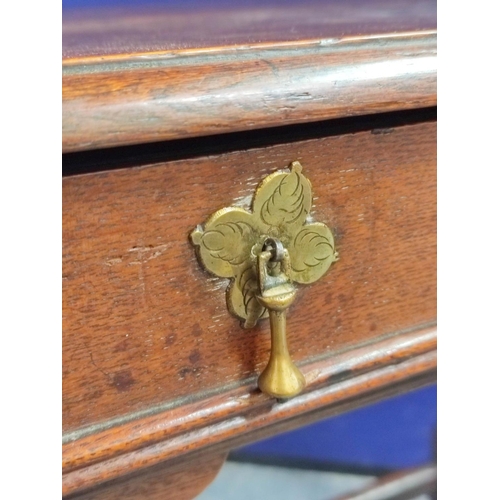 574 - Early 18th century oak hall table in the Queen Anne style with frieze drawer raised on turned balust... 