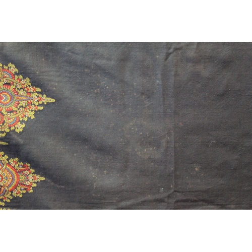 412 - Large Victorian paisley wool shawl, the black field with woven polychrome borders of boteh, some dar... 