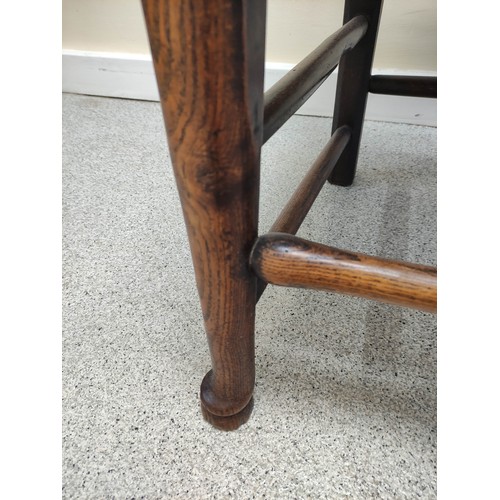 577 - 19th century oak rushwork Lancashire chair, with bobbin turned spindle back supports, raised on pad ... 