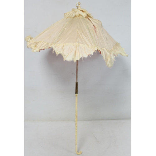 418 - Victorian black satin parasol with lace edging, cream silk lining and ebonised tapered handle and kn... 