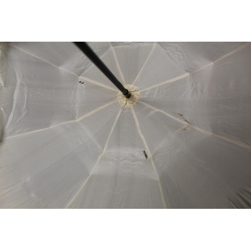 418 - Victorian black satin parasol with lace edging, cream silk lining and ebonised tapered handle and kn... 