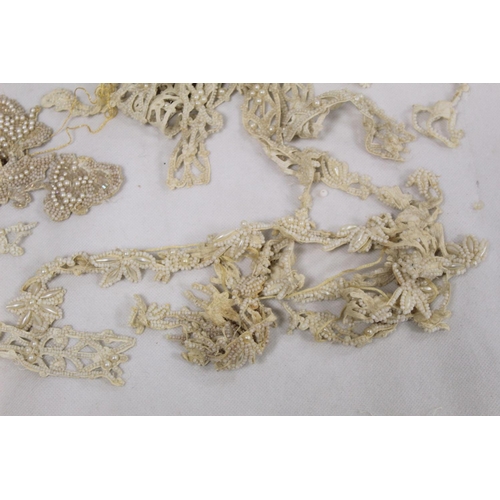 423 - Small quantity of passementerie including beadwork motifs and edgings, sequinned braid, etc.