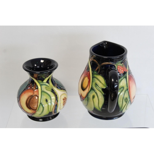 103 - Three pieces of modern Moorcroft Pottery 