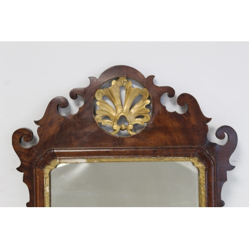 178 - George III style mahogany veneered wall mirror, fret cut frame with pierced shell pediment and mould... 