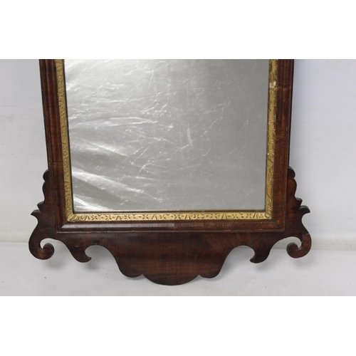 178 - George III style mahogany veneered wall mirror, fret cut frame with pierced shell pediment and mould... 