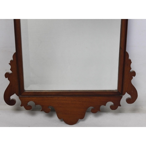 180 - George III style mahogany veneered wall mirror with fret cut frame, pierced bird pediment and bevell... 