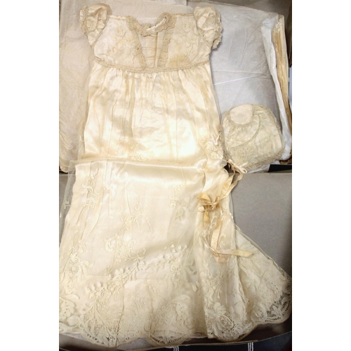 430 - Antique lace and net baby's christening gown lined in cream silk with similar bonnet and four lace a... 