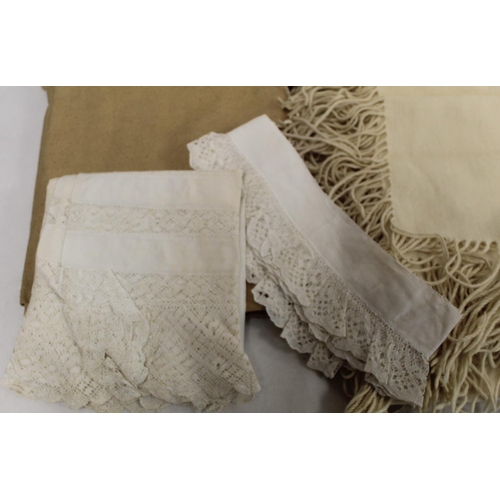 435 - Cream wool shawl or blanket with fringing; piece of cream wool blanket; two natural cotton twill she... 