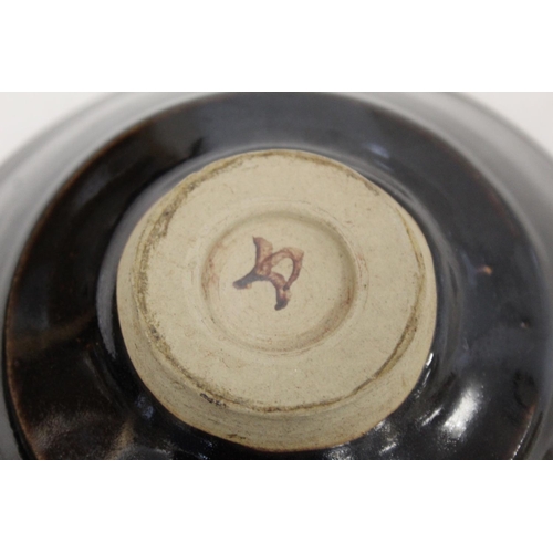 492 - 20th century Tenmoku glazed circular pottery bowl, painted mark to base, 20cm diam.