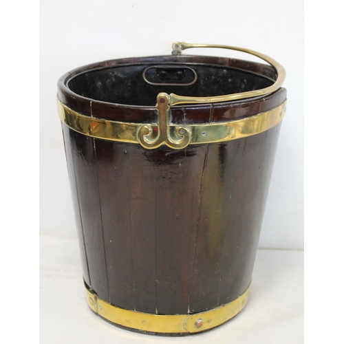 508 - Late 18th century Irish mahogany brass bound plate bucket of tapered coopered form with swing handle... 