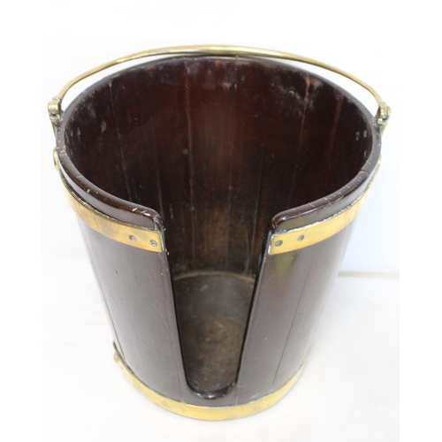 508 - Late 18th century Irish mahogany brass bound plate bucket of tapered coopered form with swing handle... 