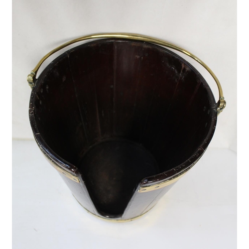 508 - Late 18th century Irish mahogany brass bound plate bucket of tapered coopered form with swing handle... 