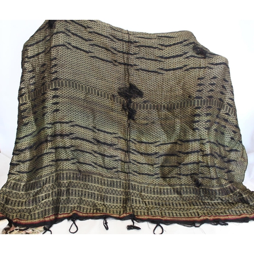 454 - Eastern brocade shawl woven with black, metallic gold and red threads, with fringing to borders, app... 