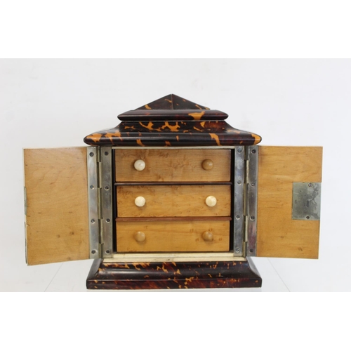 464 - 19th century tortoiseshell veneered table top cabinet of rectangular form, the domed top with hinged... 