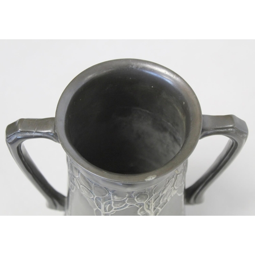 466 - Tudric pewter Art Nouveau twin handled loving cup by David Veazey for Liberty & Co., decorated w... 