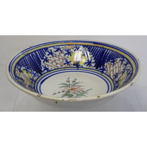 471 - 19th century Continental tin glazed Delft bowl with polychrome floral decoration and hatched border,... 