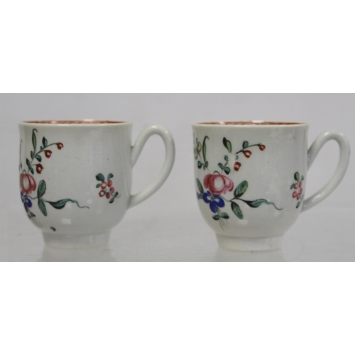 476 - Two 18th century English porcelain coffee cups decorated with polychrome floral sprays and iron red ... 