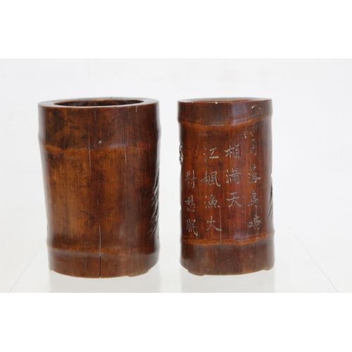 478 - Two 19th or early 20th century Chinese carved bamboo brush pots decorated with figures in landscapes... 