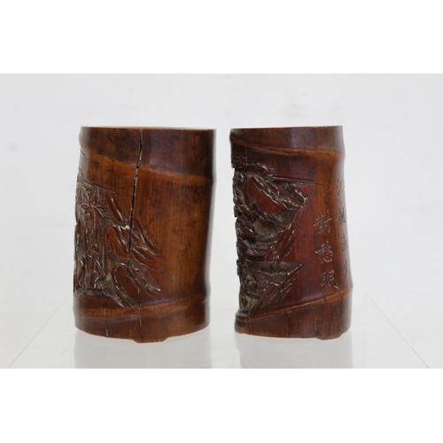 478 - Two 19th or early 20th century Chinese carved bamboo brush pots decorated with figures in landscapes... 