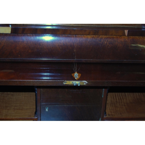 303 - Biedermeier-style mahogany bureau cabinet by Amboan, the cabinet top with a door above a short drawe... 