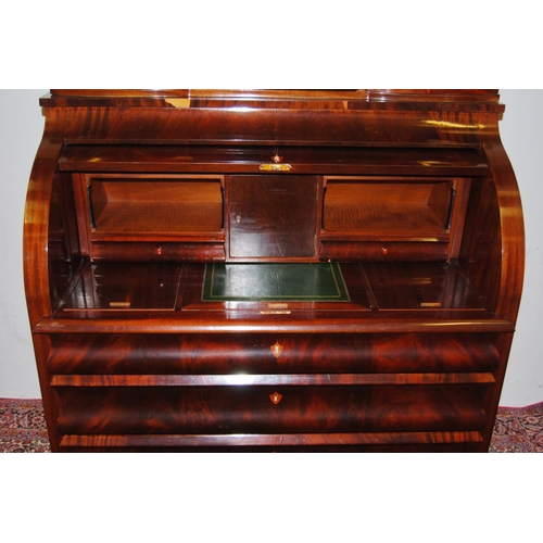 303 - Biedermeier-style mahogany bureau cabinet by Amboan, the cabinet top with a door above a short drawe... 