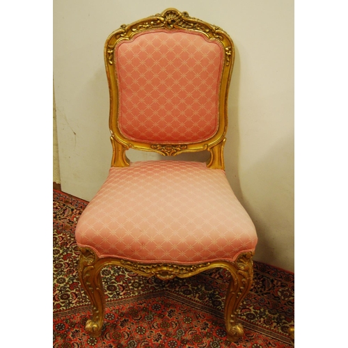 305 - Pair of Louis XV style giltwood parlour chairs decorated with moulded roses, floral panels and acant... 