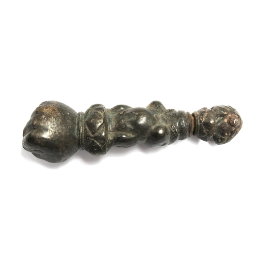 290 - Eastern bronze weight or toggle with ram's head finial, moulded figure of buddha as a child and fist... 